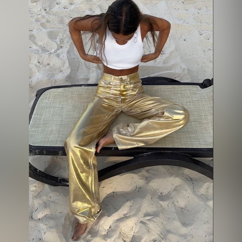 Gold metallic pants size LARGE runs small very good conditions.